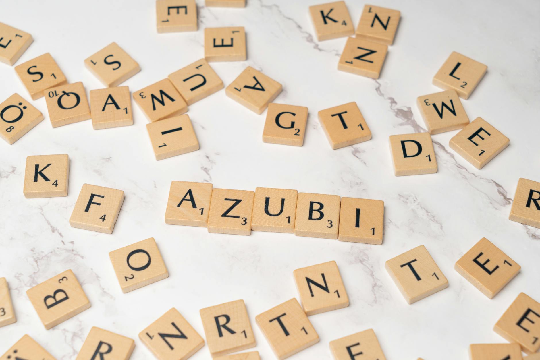 Scrabble letters spelling out the word zuza