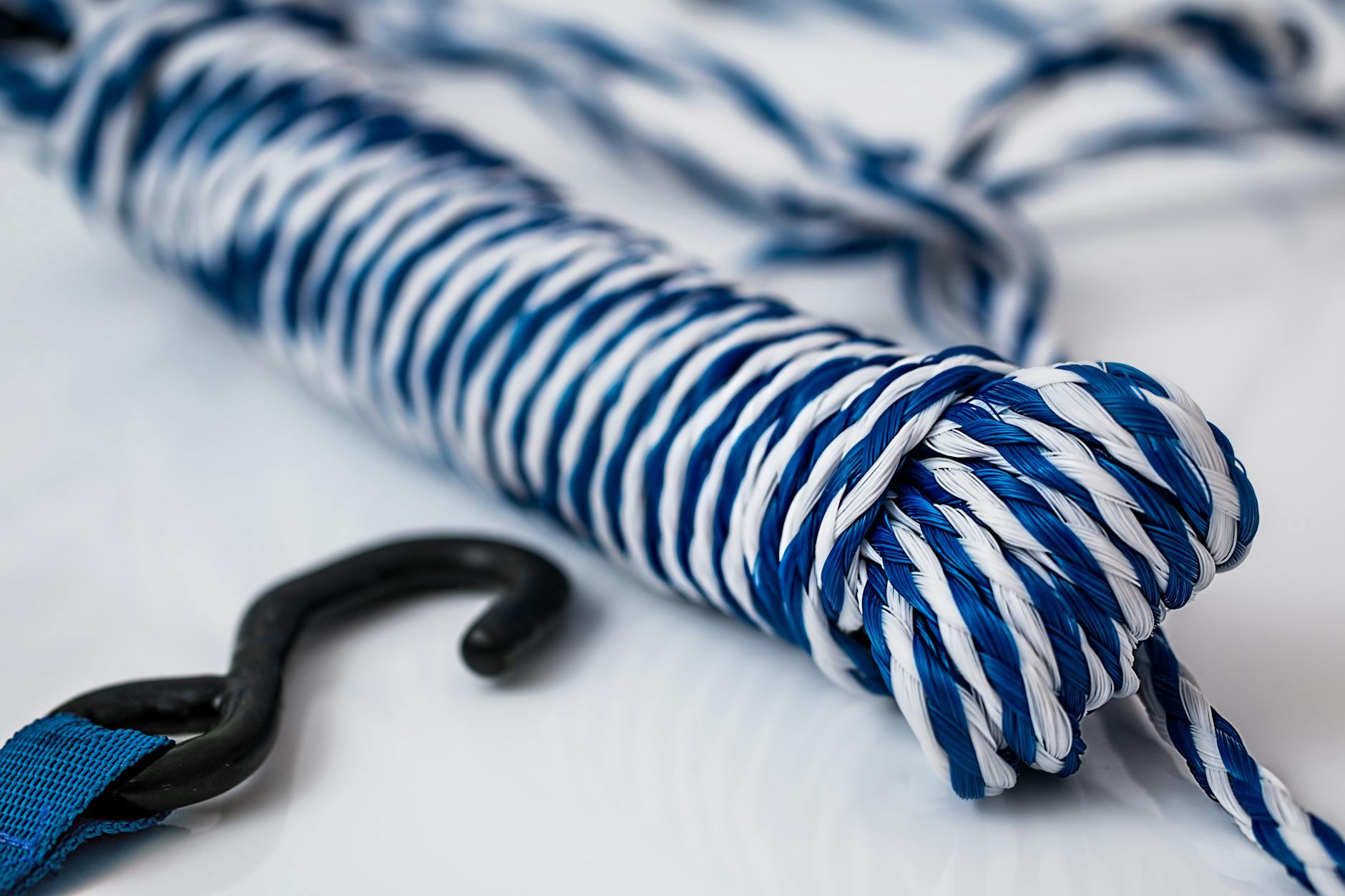 Blue and White Rope in Bundle on White Table