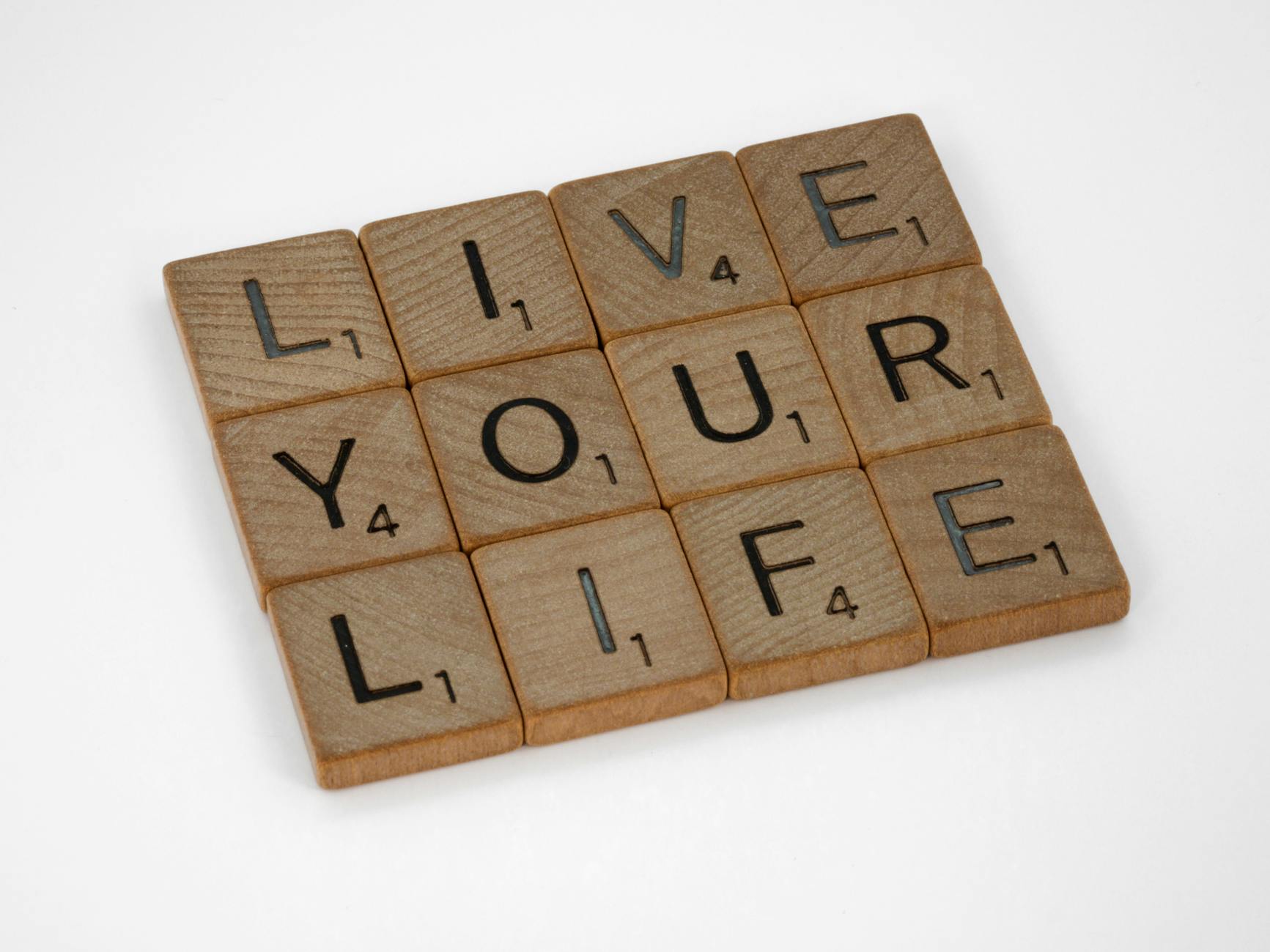 Brown Wooden Blocks on White Surface