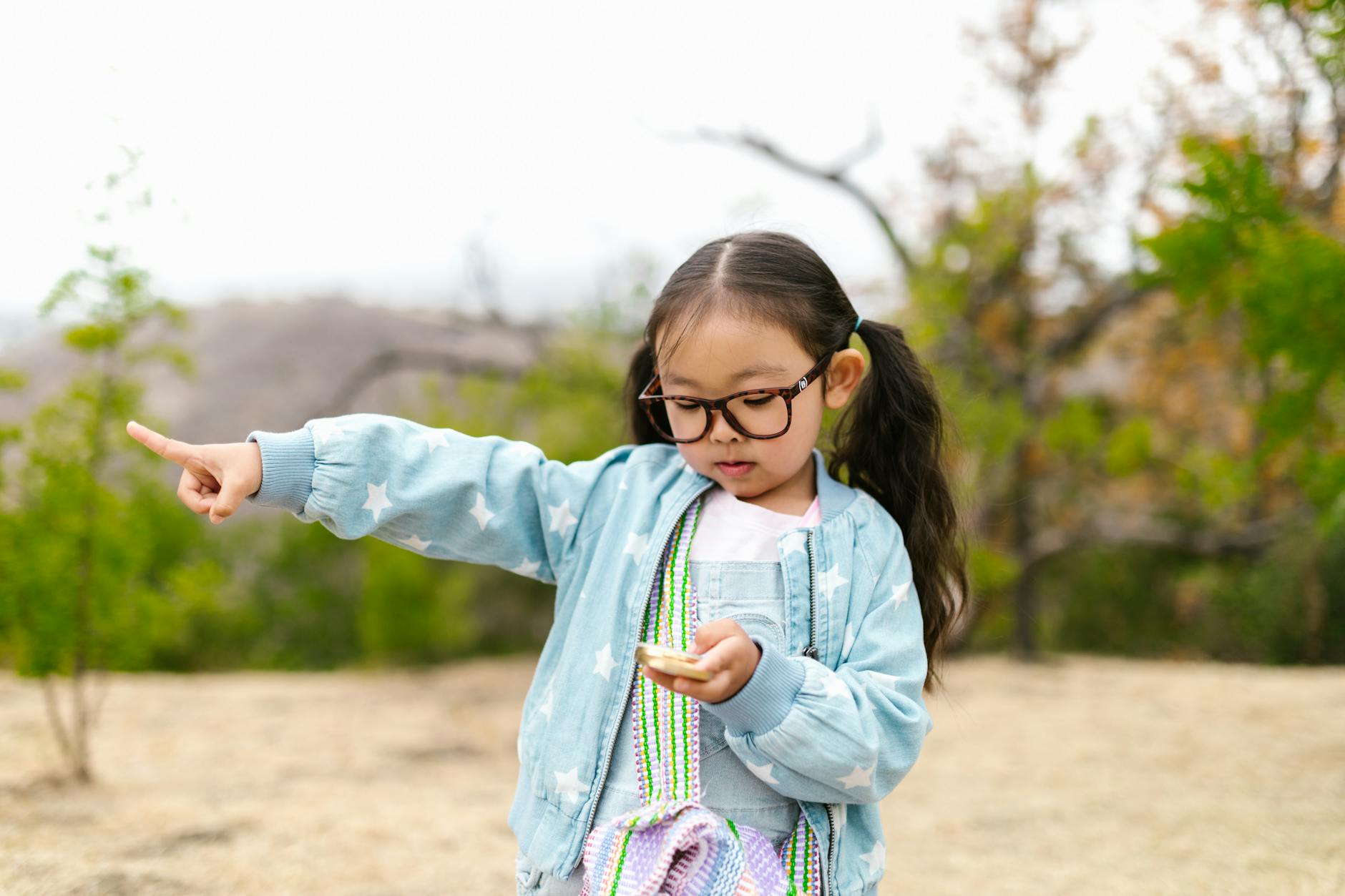 Kid Pointing Her Finger