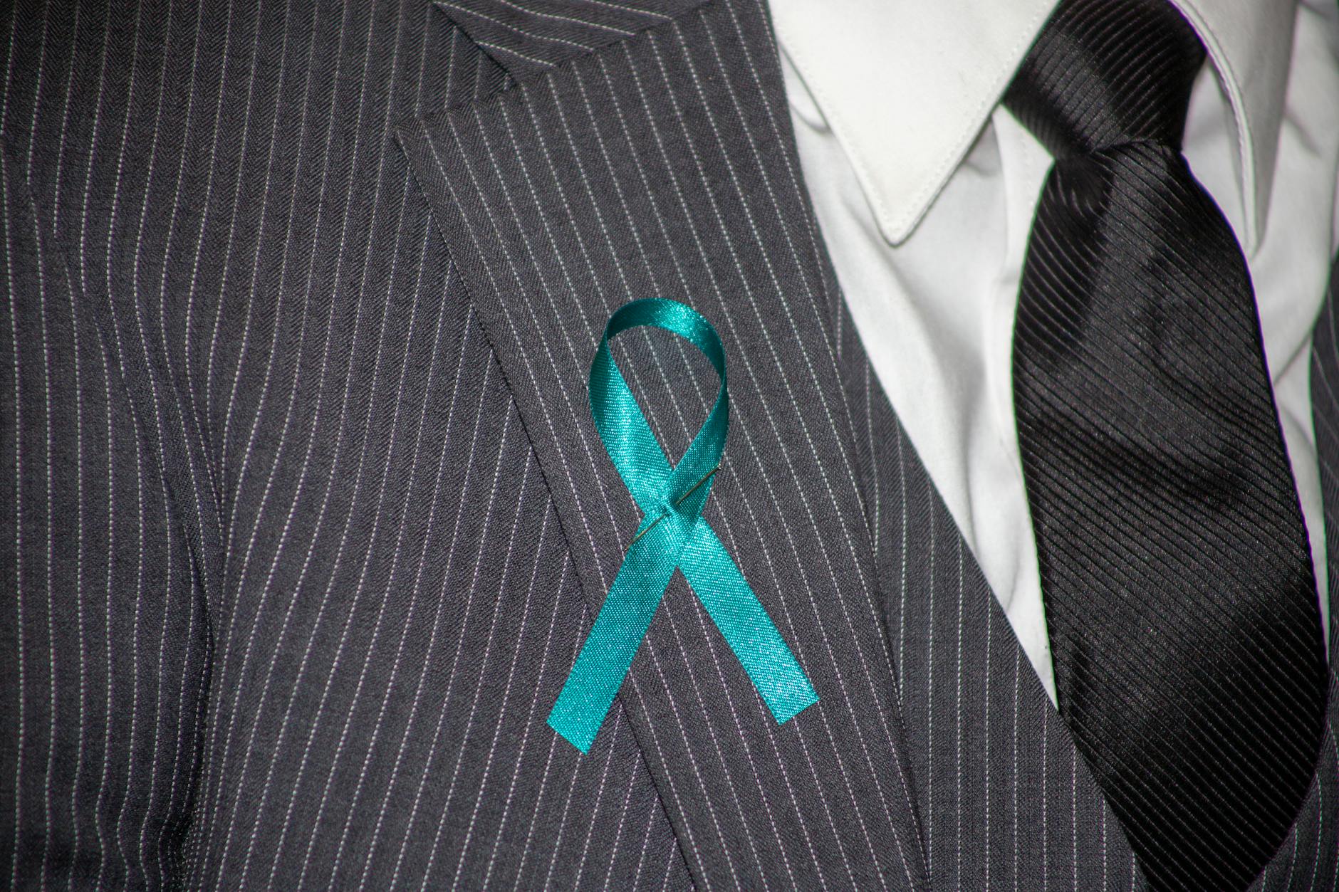 A Ribbon Pin on a Suit Lapel