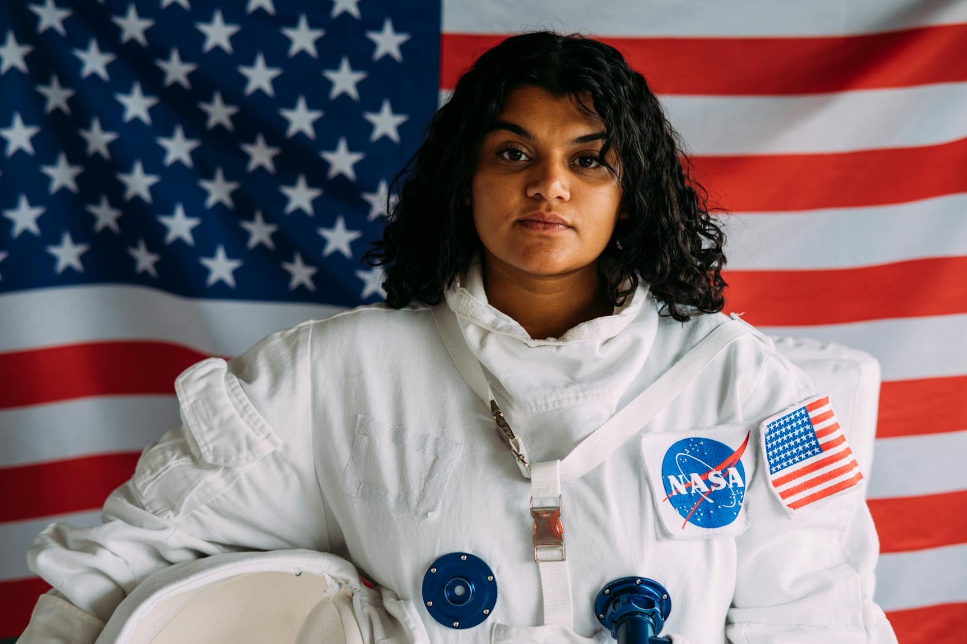 Woman Holding A Space Suit Helmet