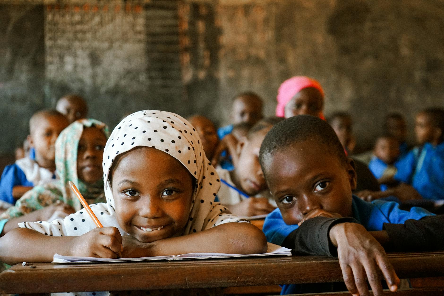 Smiling Children in African Classroom Setting