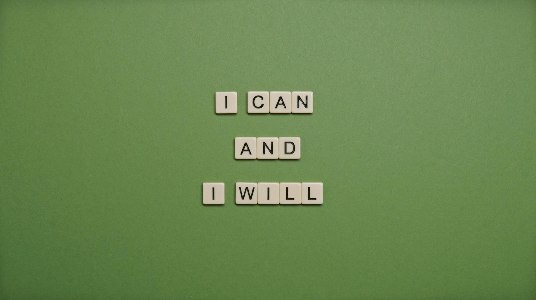 I Can and I Will Text On Green Background