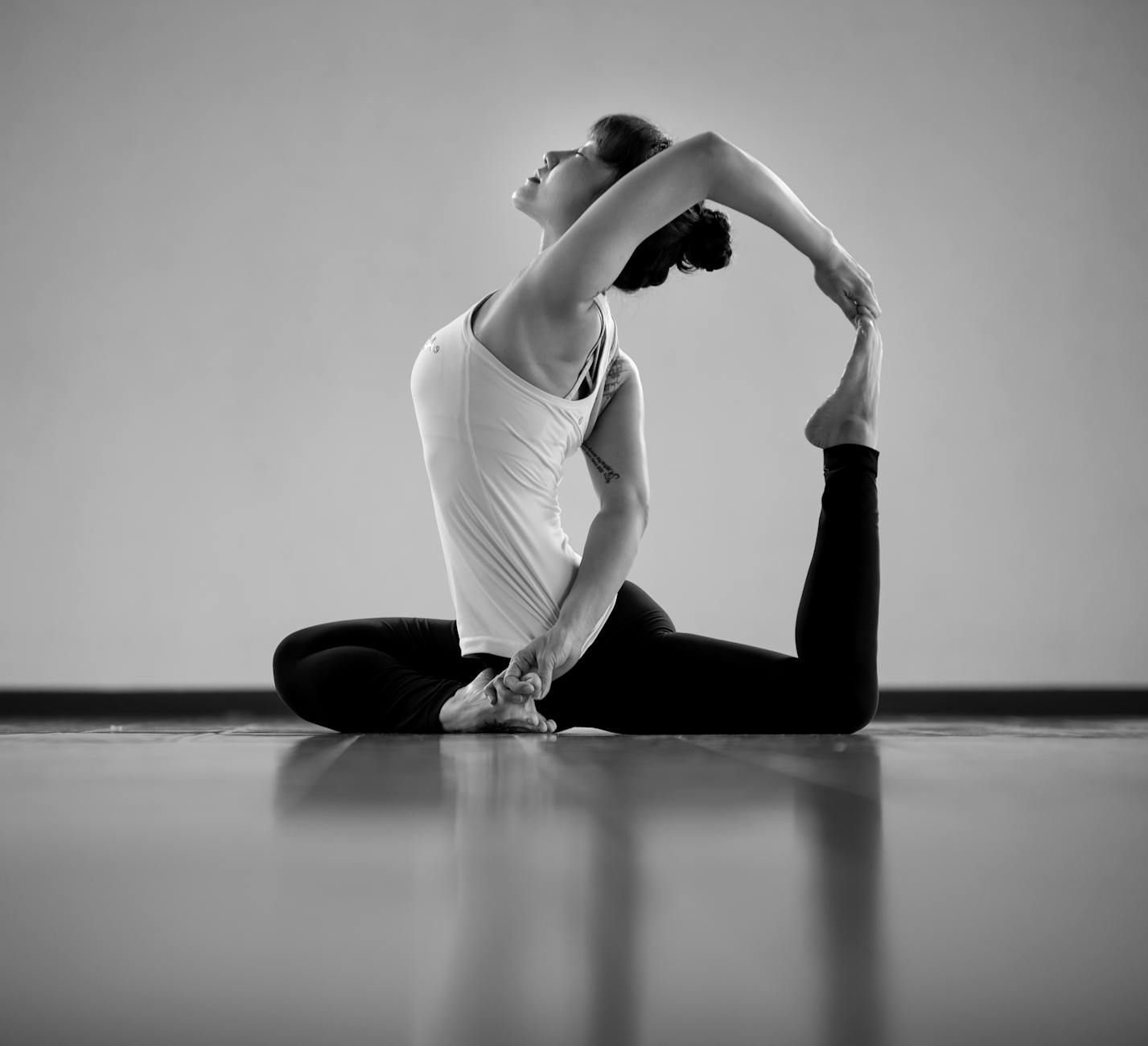 A Woman Stretching on the Floor