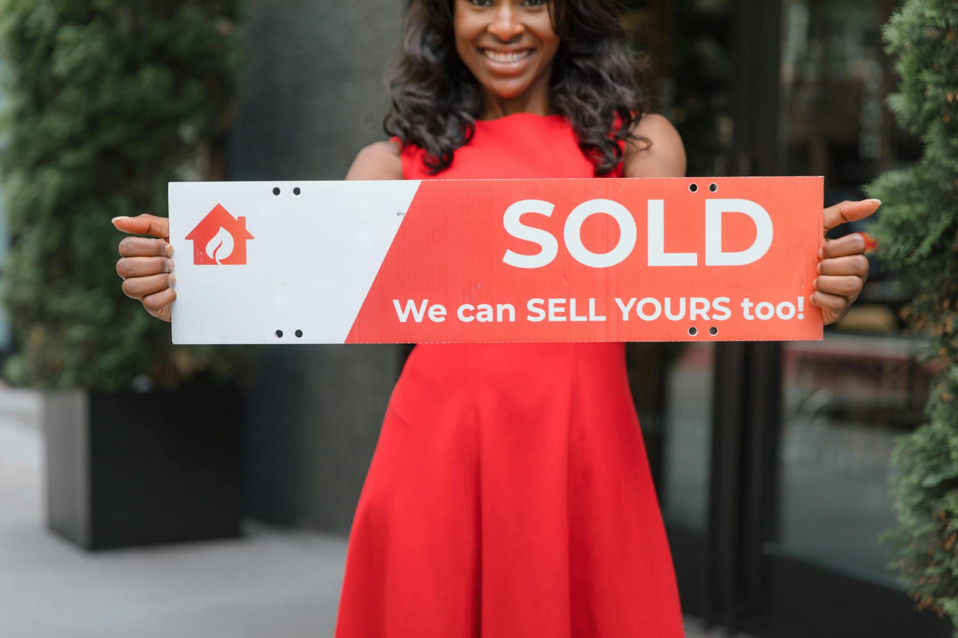 Woman Holding Sign 